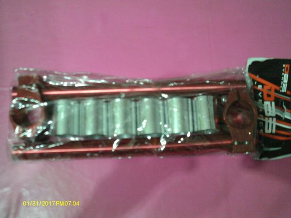 Guidon bracelets alu Rouge, pour tubes de fourche de 27 à 33 mms